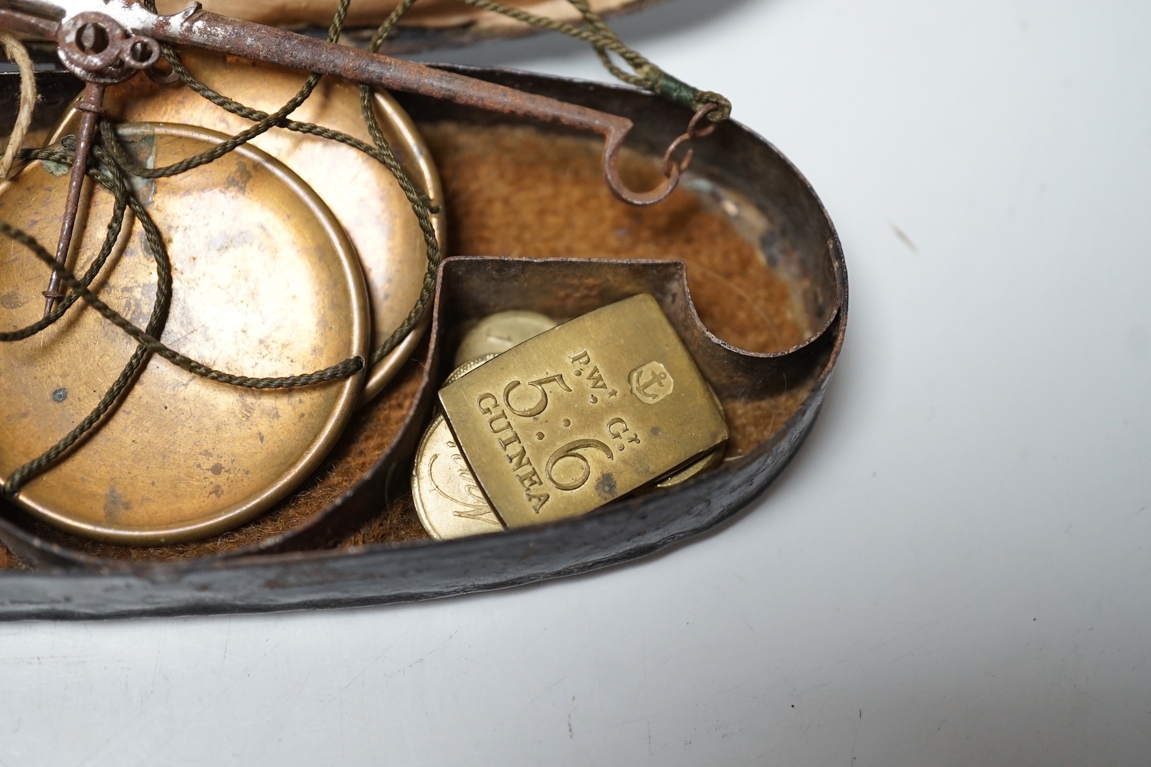 A George III sovereign/guinea pan scale with weights